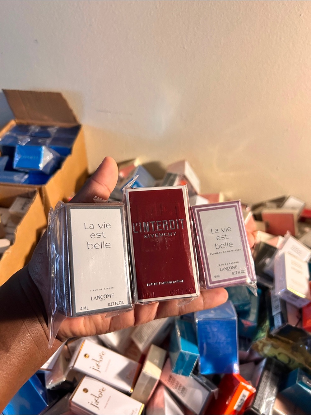 Dior assortment with red and white perfume boxes